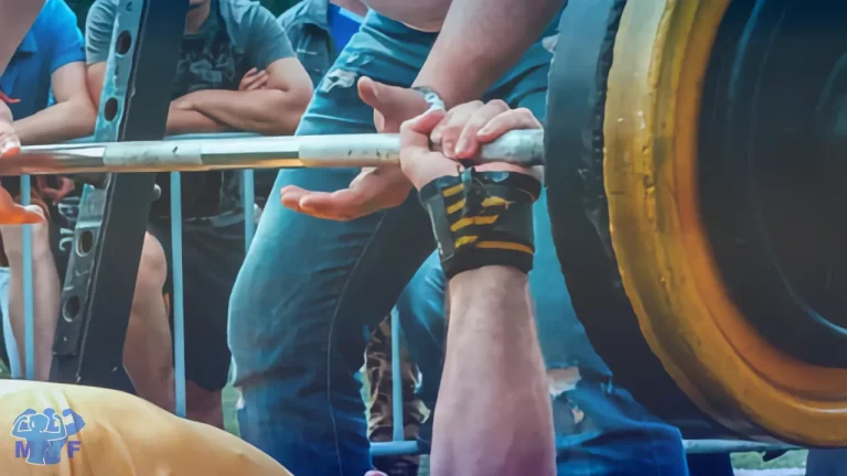 Man performing bench press as part of a push pull legs 3 day split