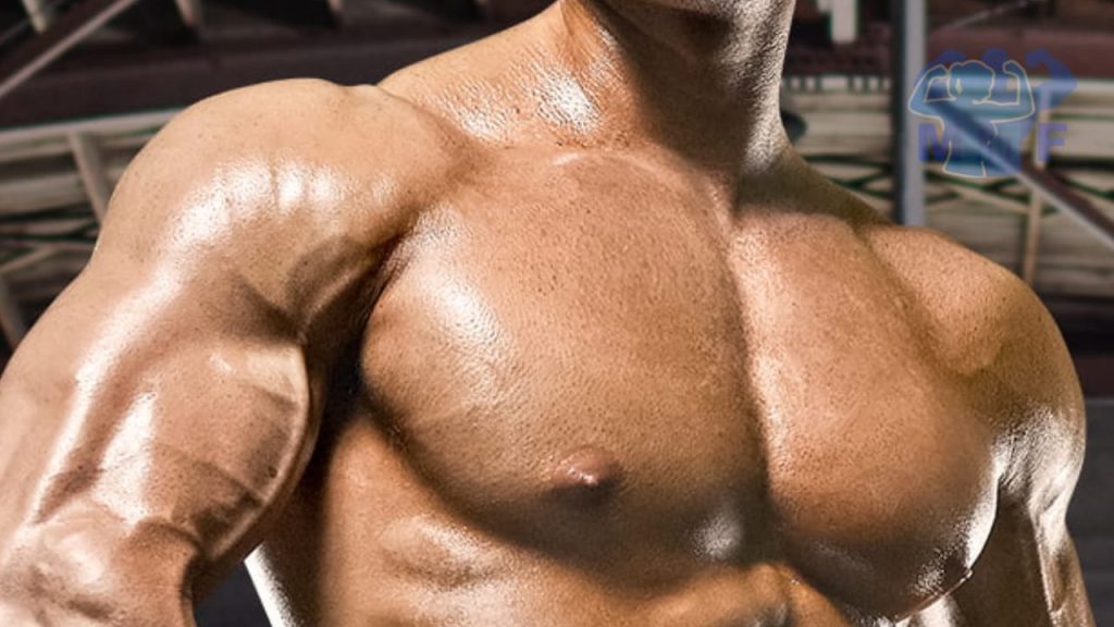 Chest workout routine for mass, bodybuilder with large defined chest.